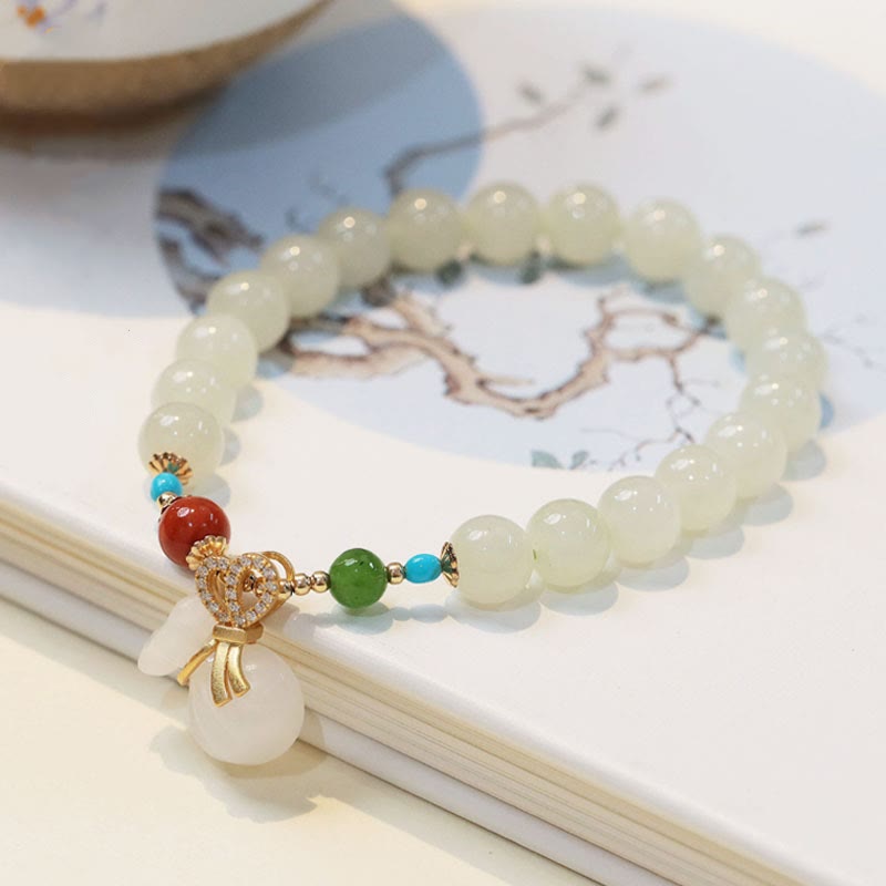 EverestArtstudios Natural Hetian White Jade 14K Gold Plated Money Bag Blessing Bracelet