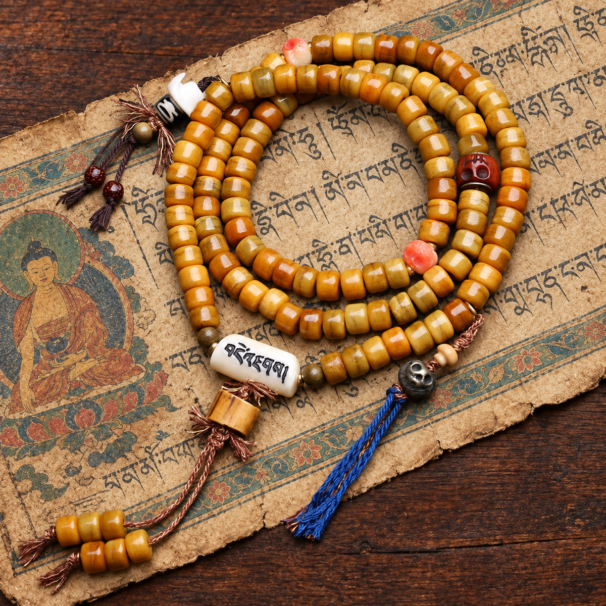 EverestArtstudios Yak Bone 108-Bead Mala with Dzi-Style Agate in Six Styles — styled on wood with a scripture display prop
