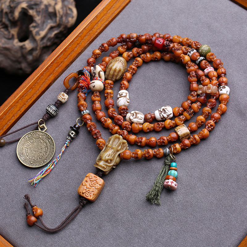 EverestArtstudios Carved Yak Bone 108-Bead Mala with Bagua and Mani Motif Charms