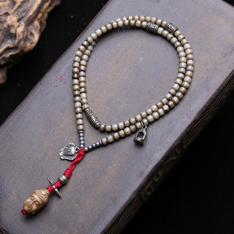 EverestArtstudios Bone 108-Bead Mala with Nine-Eye Motif and Conch Accents