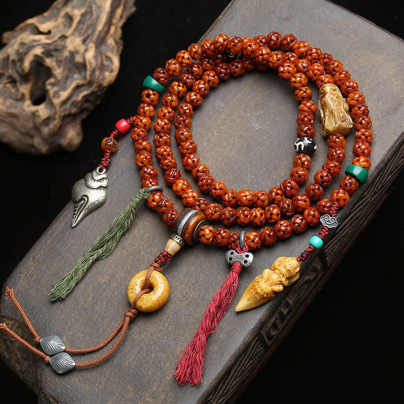 EverestArtstudios Carved Bone 108-Bead Mala with Safety Ring and Bird Motif Charms