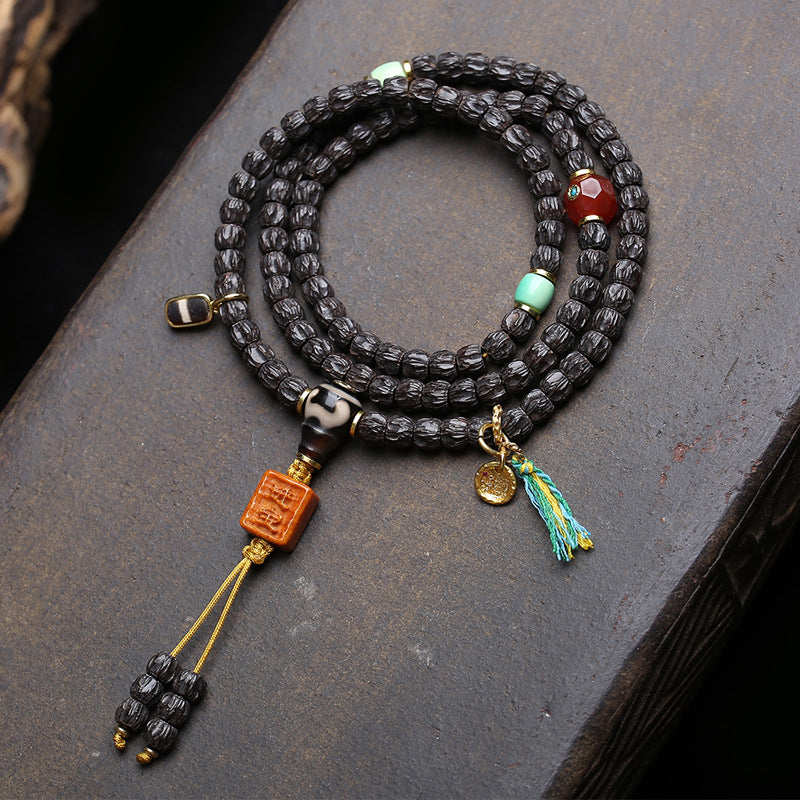 EverestArtstudios Coconut Prayer Beads with Carved Seed and Agate Accents