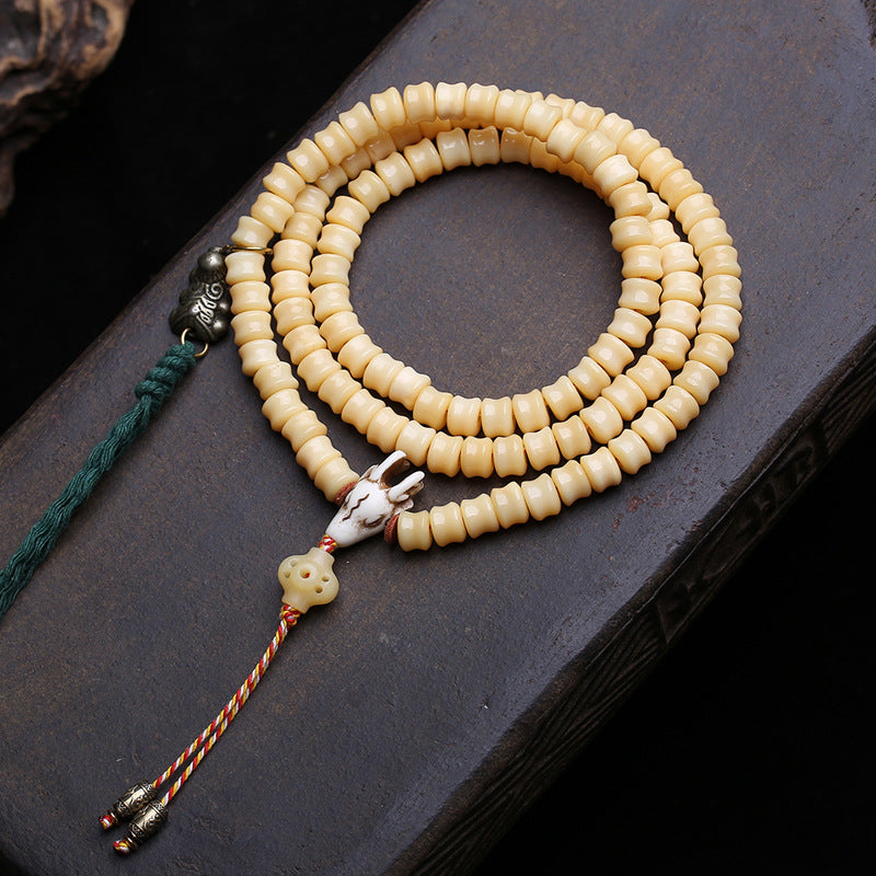 EverestArtstudios Carved Bone 108-Bead Mala with Decorative Metal Charms