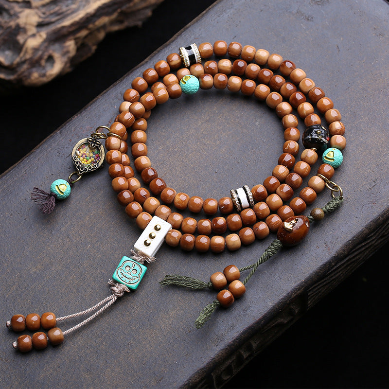 EverestArtstudios 108-Bead Mala with Phoenix Eye Bodhi, Agate and Antler Accents