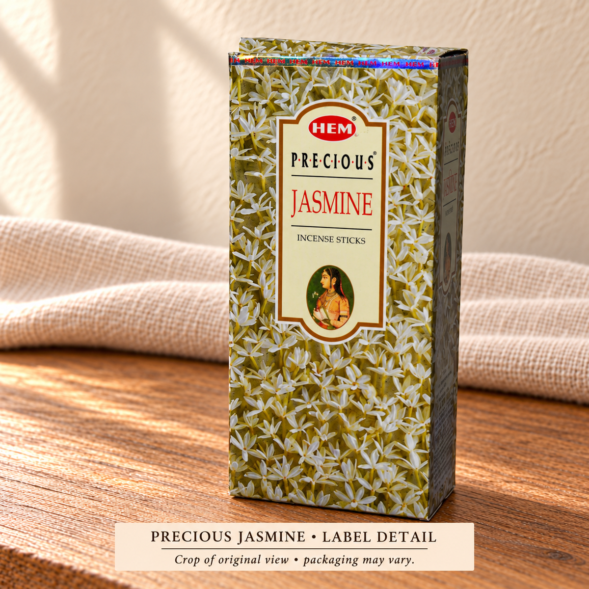 Precious Jasmine carton label — source-view crop