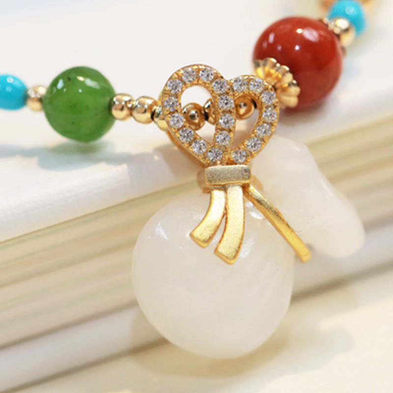 EverestArtstudios Natural Hetian White Jade 14K Gold Plated Money Bag Blessing Bracelet