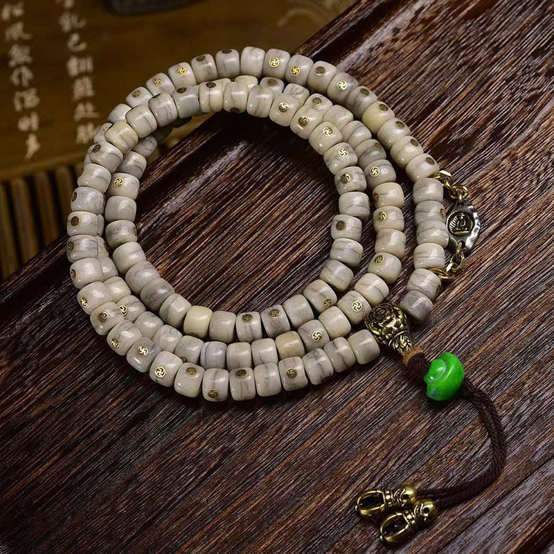 EverestArtstudios Vintage Yak Bone Antique Copper Auspicious Wan 108-Bead Mala — overall display