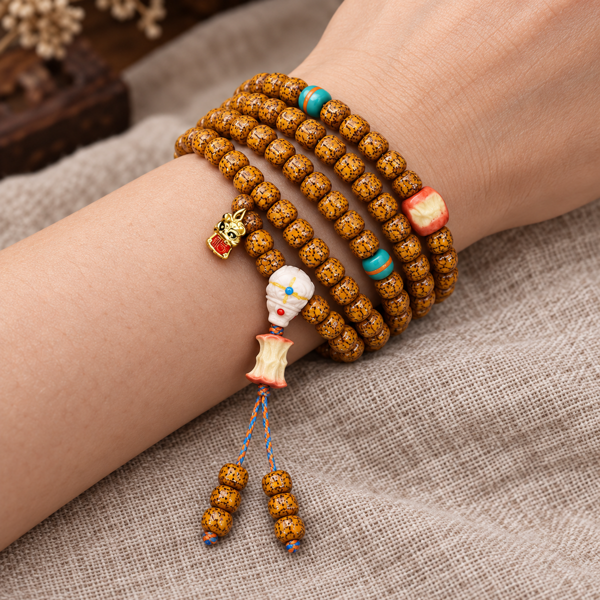 EverestArtstudios Natural Aged Crackled Hainan Xingyue Bodhi 108-Bead Mala — wrist resting