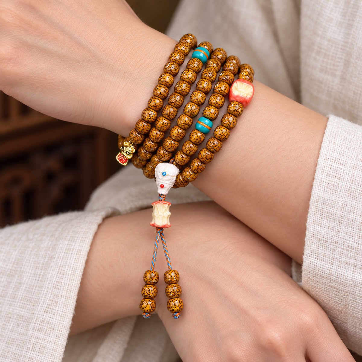 EverestArtstudios Natural Aged Crackled Hainan Xingyue Bodhi 108-Bead Mala — wrist crossed