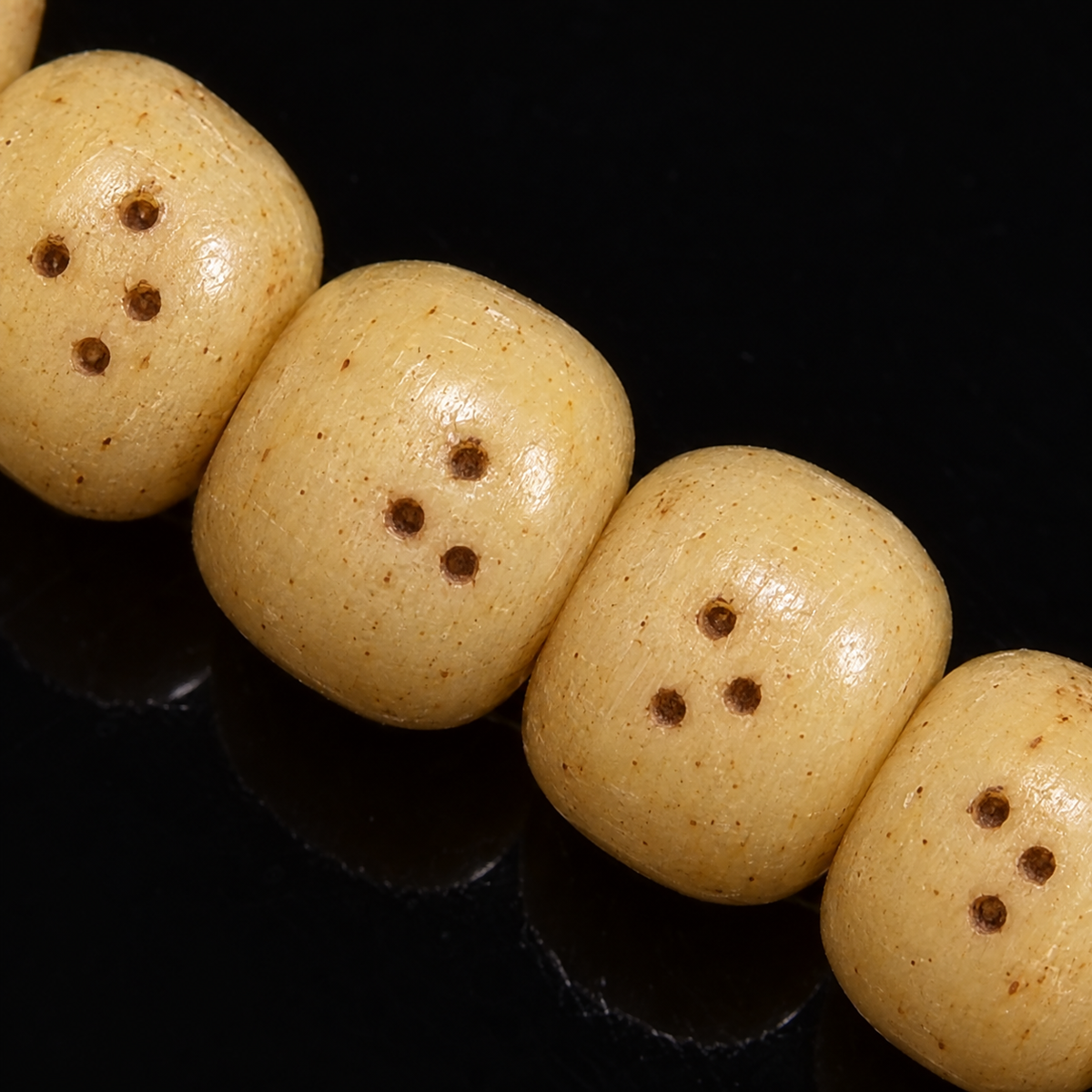 Camel bone Tibetan mala — surface detail