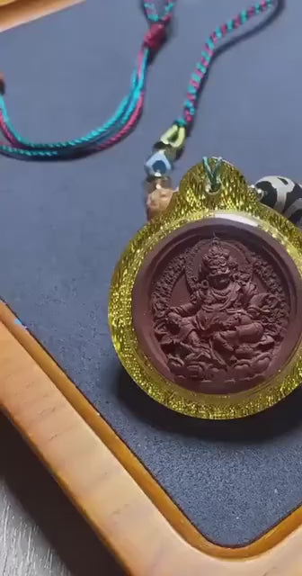 Load video: Handpainted Yellow Dzambhala Tsa Tsa, Tibetan God of Wealth Amulet, Sacred Medicine Clay Gau Box Pendant, Miniature Thangka Necklace Gift